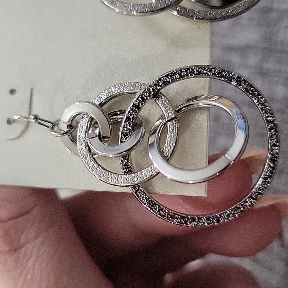 Bold Elements Silver Hoop Earrings - Picture 2 of 2